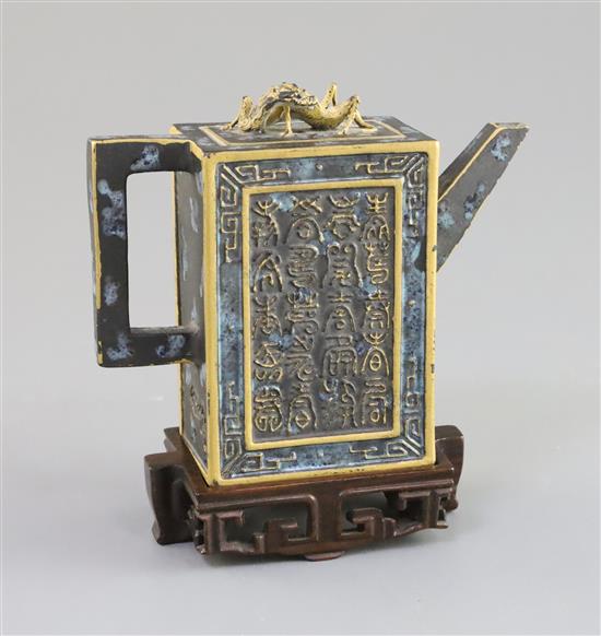 A Chinese enamelled biscuit Forty Shou miniature wine pot, 19th/20th century, H. 10cm, wood stand, fitted box